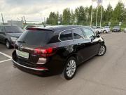 Коричневый Opel Astra 1.4 AT (140 л.с.) 2013 фото 1