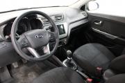 Зеленый Kia Rio 5-speed 1.6 MT (123 л.с.) 2014 фото 9