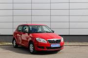 Красный Skoda Fabia 1.2 MT (70 л.с.) 2013 фото 2