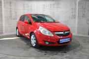 Красный Opel Corsa 1.2 AMT (80 л.с.) 2008 фото 2