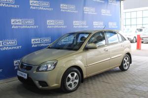 бежевый Kia Rio, II Рестайлинг 1.4 AT (97 л.с.) 2010
