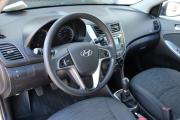 Серебряный Hyundai Solaris 1.4 MT (107 л.с.) 2016 фото 9