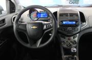 серый Chevrolet Aveo 1.6 MT (115 л.с.) 2013 фото 18