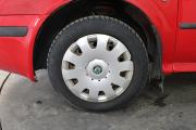 Красный Skoda Octavia 1.4 MT (75 л.с.) 2009 фото 13