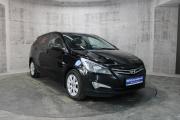 Черный Hyundai Solaris 1.6 AT (123 л.с.) 2014 фото 2