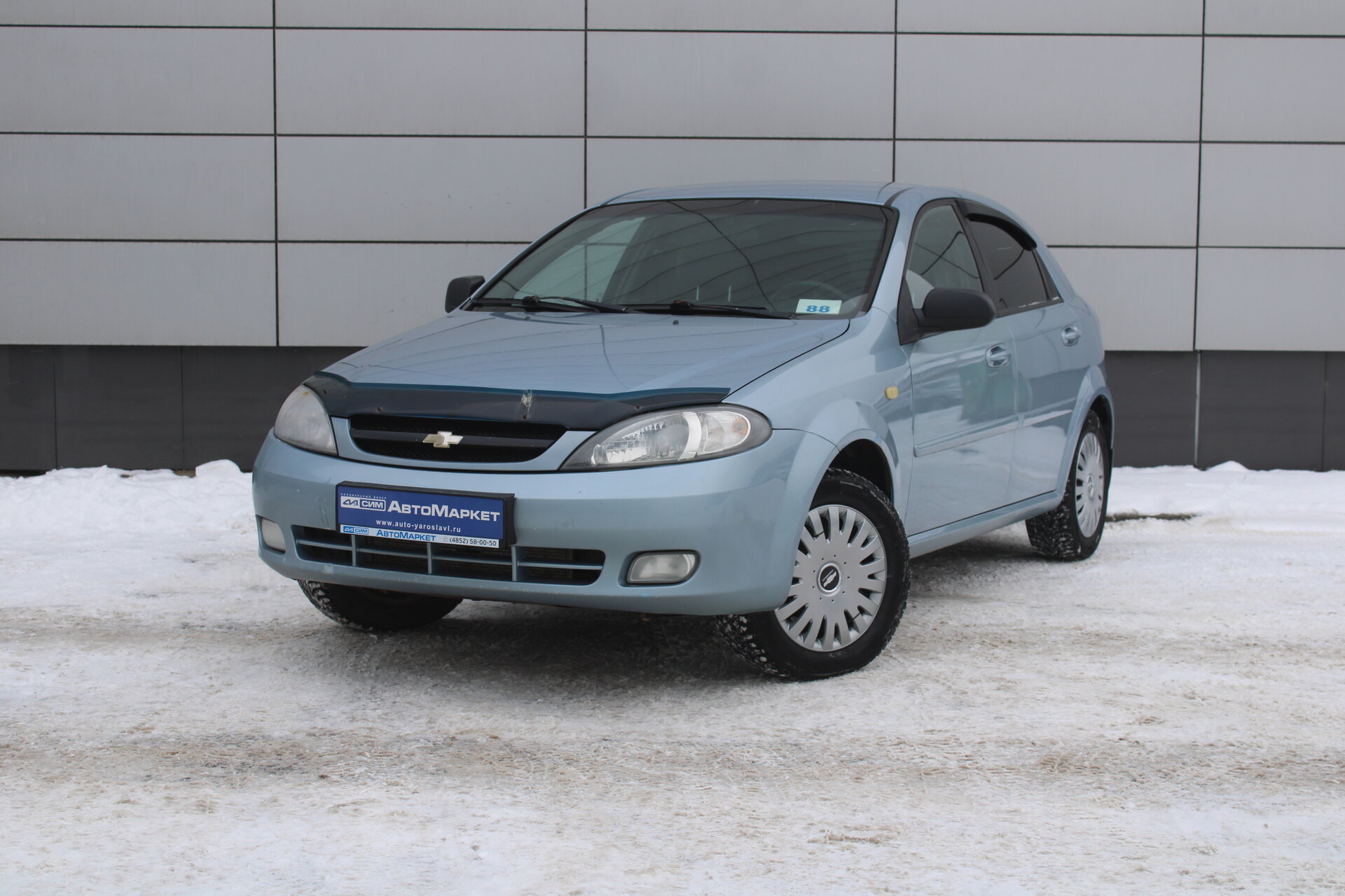 Голубой Chevrolet Lacetti 1.4 MT (94 л.с.) 2010