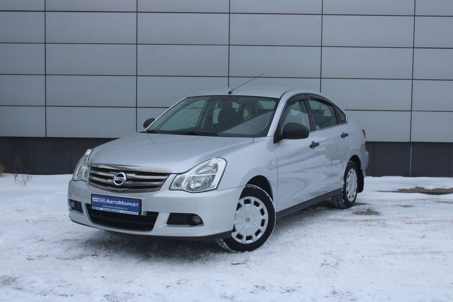 Серебряный Nissan Almera 1.6 MT (102 л.с.) 2014