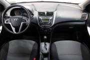 Синий Hyundai Solaris 1.4 AT (107 л.с.) 2014 фото 8