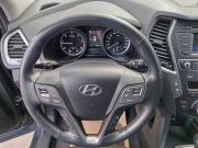 синий Hyundai Santa Fe 2.2d AT (197 л.с.) 4WD 2016 фото 15