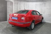 Красный Skoda Octavia 1.4 MT (75 л.с.) 2009 фото 5