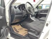 белый Suzuki Grand Vitara 2.0 AT (140 л.с.) 4WD 2011 фото 12