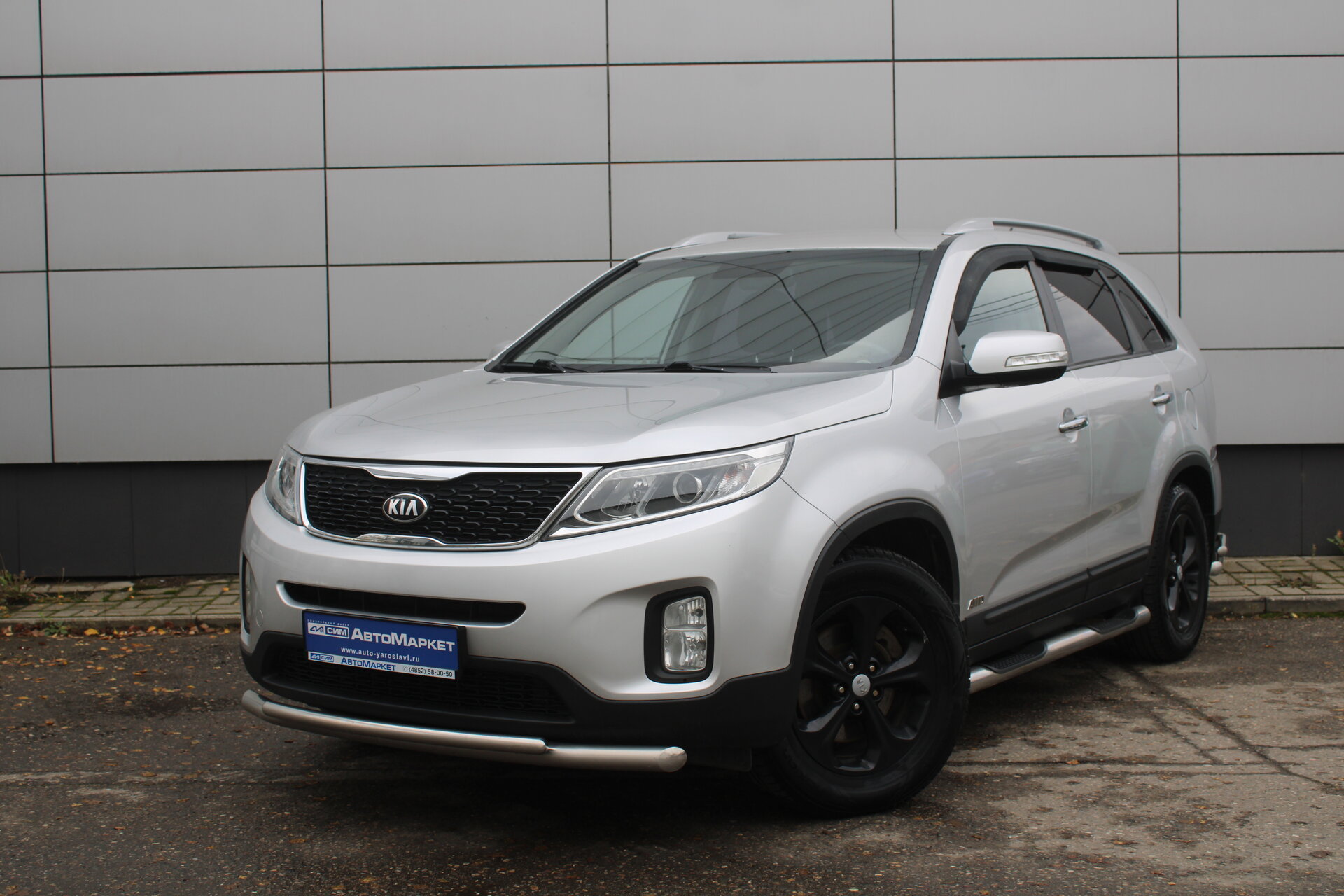 Серебряный Kia Sorento, II Рестайлинг 2.4 AT (175 л.с.) 4WD 2013