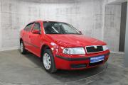 Красный Skoda Octavia 1.4 MT (75 л.с.) 2009 фото 2