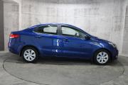 Серый Kia Rio 1.6 AT (123 л.с.) 2015 фото 3