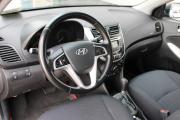 Фиолетовый Hyundai Solaris 1.6 AT (123 л.с.) 2012 фото 9