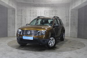 Коричневый Renault Duster 2.0 MT (135 л.с.) 4WD 2013
