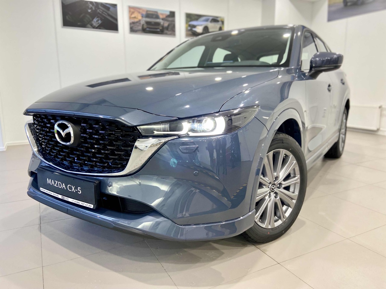 голубой Mazda CX-5 2.0 AT (150 л.с.) 4WD 2025